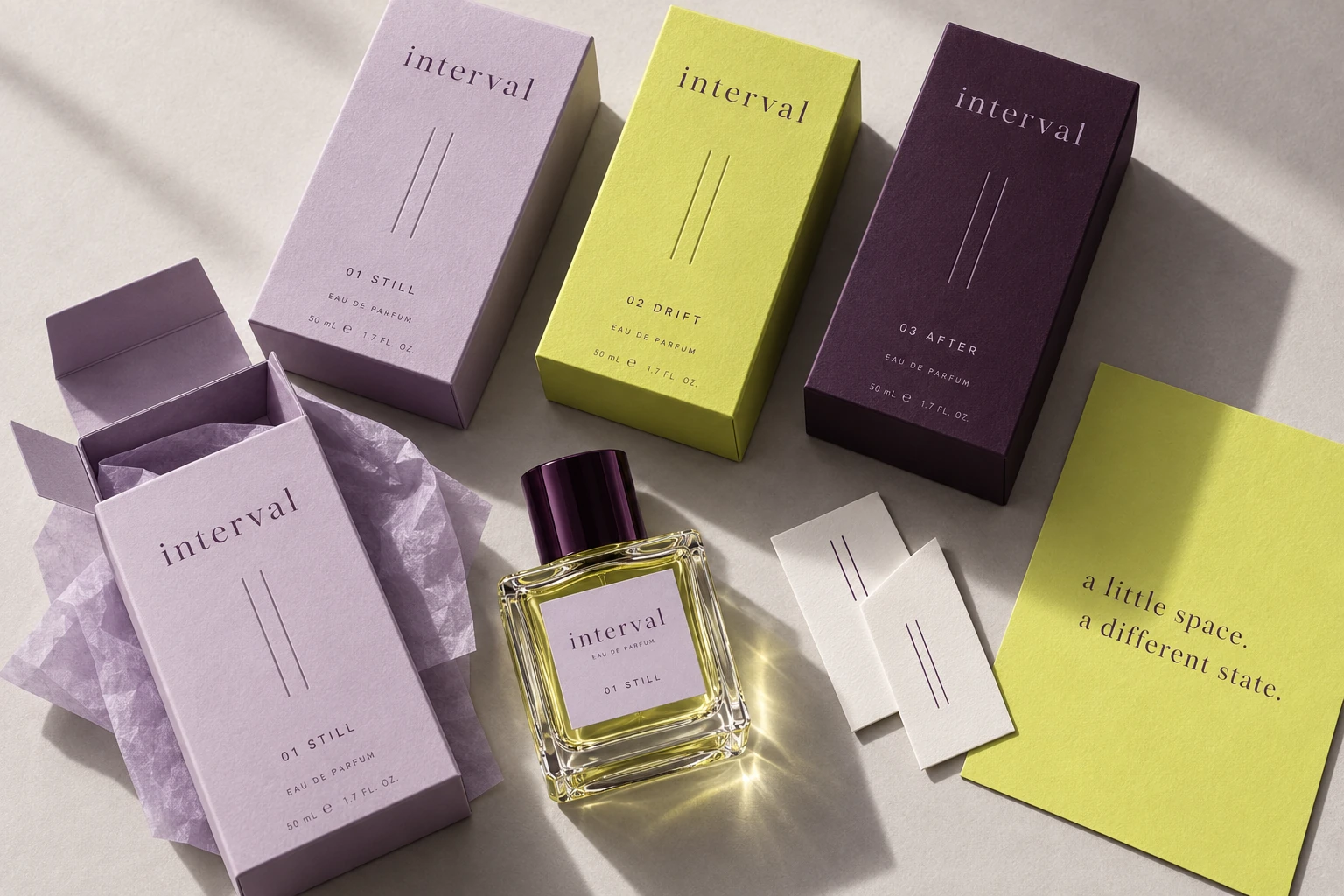 INTERVAL lilac, chartreuse and plum fragrance cartons with pause symbols, tissue, scent cards and a clear perfume bottle